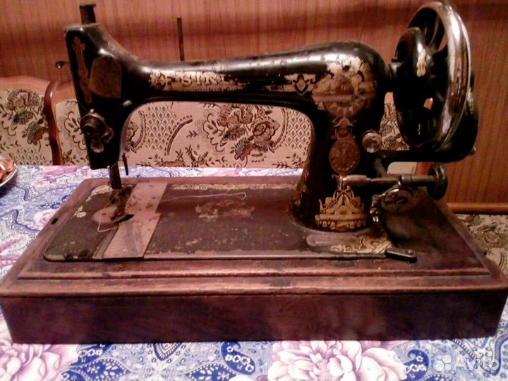 Швейная машина Sinqer, челноки и шпульки