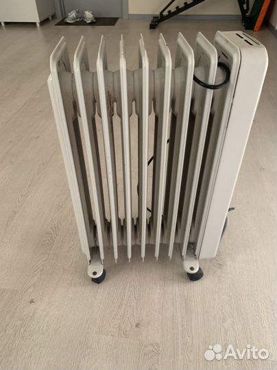 Масляный обогреватель delonghi