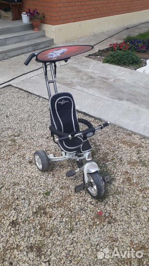 Детский трехколесный велосипед с ручкой