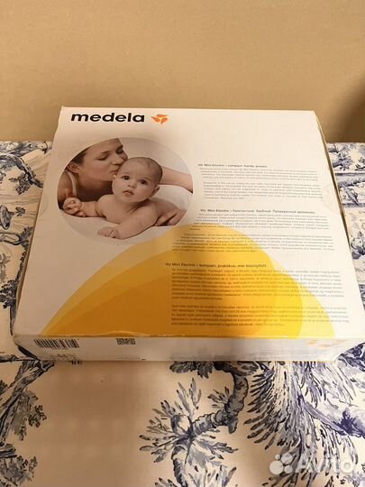 Молокоотсос medela электрический