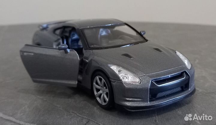 Модель автомобиля Nissan GT-R 35 Welly оригинал