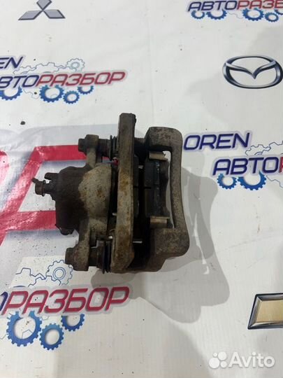 Суппорт тормозной задний правый Kia Cerato 2 1.6