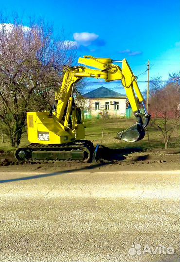 Услуги мини экскаватора. Экскаватор