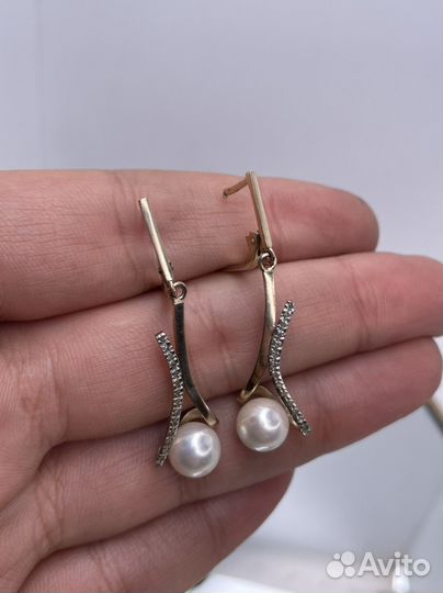 Золотые серьги с бриллиантами 5.11 гр. по 3400 гр