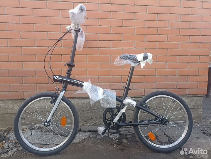Новый складной велосипед b'twin