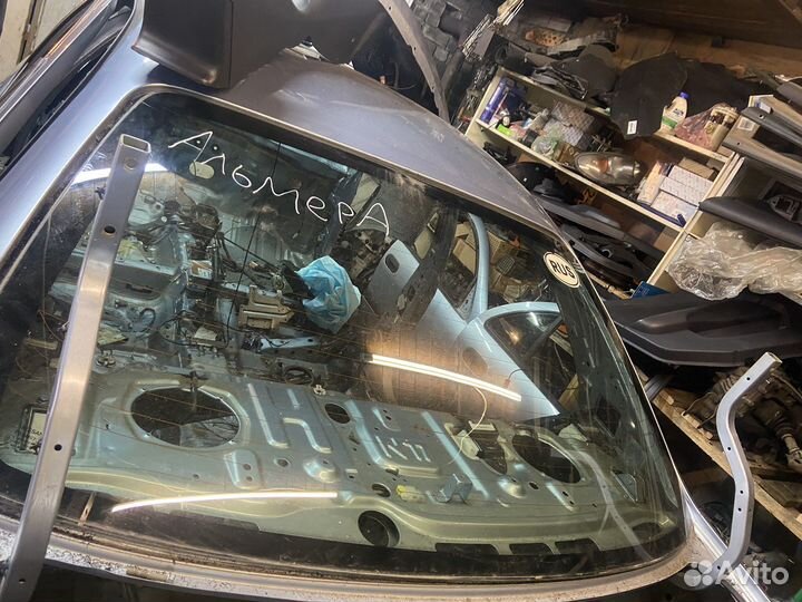 Стекло заднее Nissan Almera N16