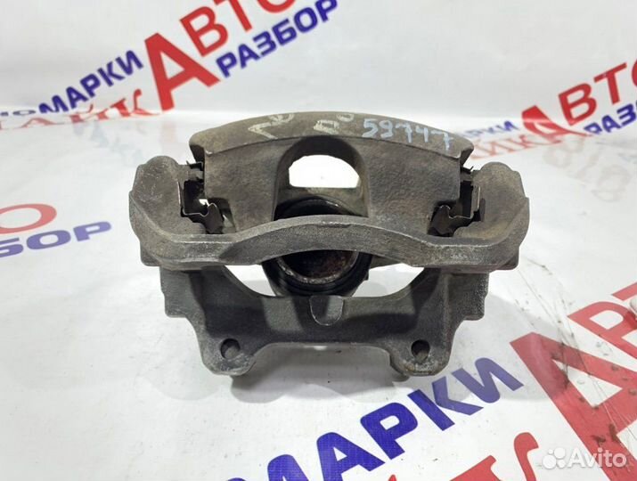 Суппорт тормозной передний левый Fiat Doblo