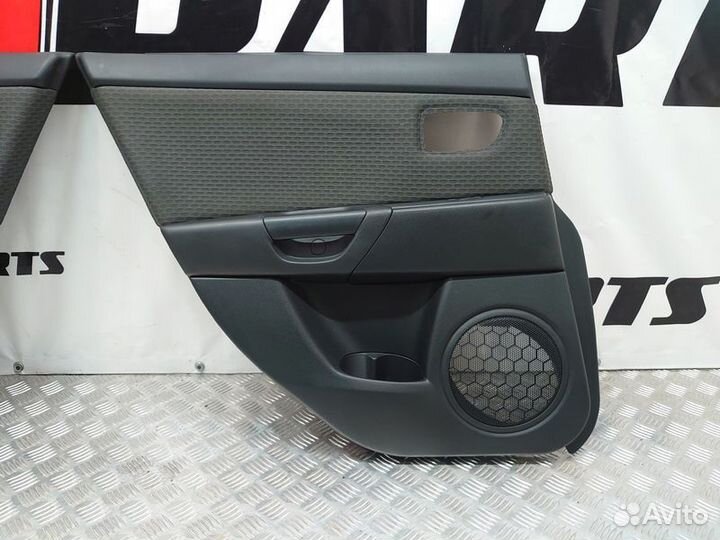 Обшивка двери задней Mazda 3 BK рестайлинг (2006—2