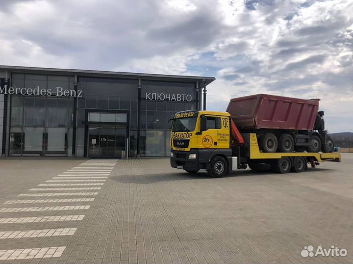 Грузовой эвакуатор-манипулятор-трал