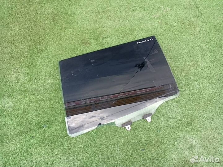 Стекло дверное заднее левое Mitsubishi Lancer 9