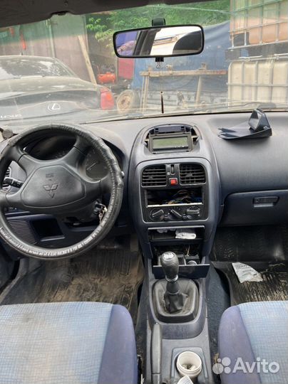 Mitsubishi carisma разбор