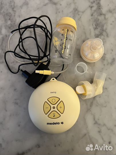 Молокоотсос medela swing электрический