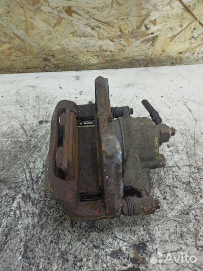 Тормозной суппорт передний левый Opel Astra J