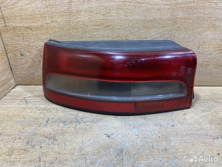 Фонарь левый Mazda 323 BG Арт. 111381