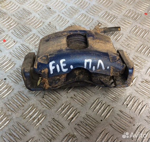Суппорт передний левый на Форд Фиеста