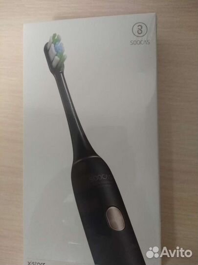 Электрическая зубная щётка