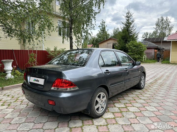 Mitsubishi Lancer 1.6 МТ, 2004, 165 000 км