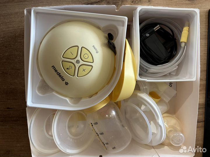 Молокоотсос medela swing электрический и ручной