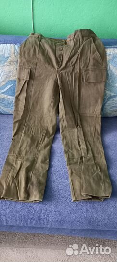 Костюмы камуфлированные, плащ-накидка, шапки и пр