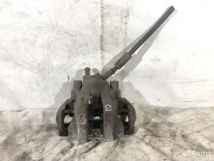 Суппорт тормозной задний левый Mercedes-Benz