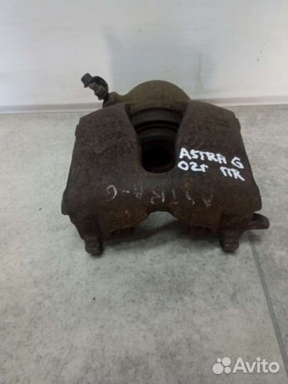 Суппорт тормозной передний правый Opel Astra G