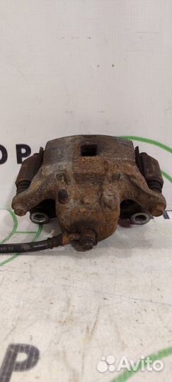 Суппорт передний левый Nissan Juke F15E HR16DE