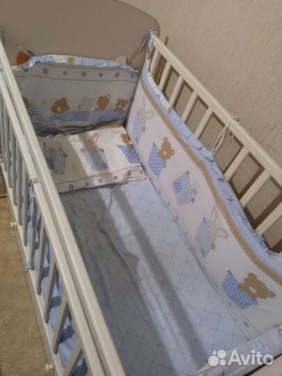 Детская кроватка с поперечным маятником