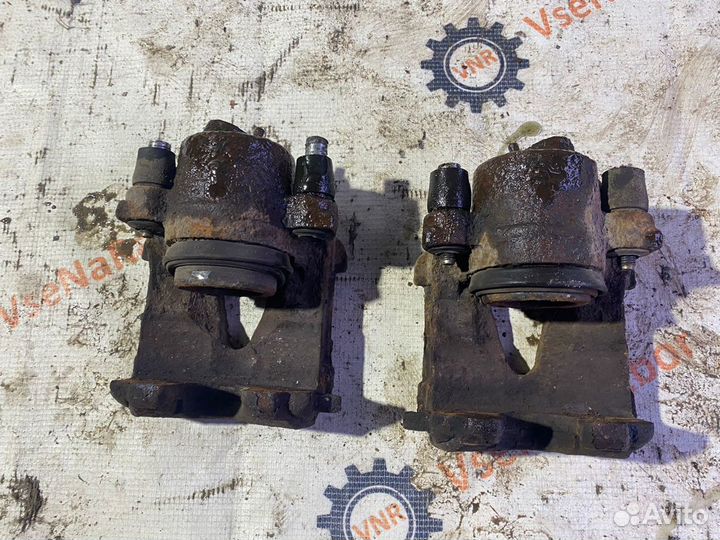 Суппорт передний VW Polo 1.4