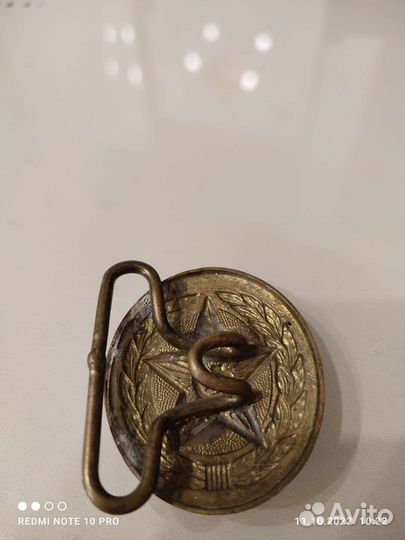 Пряжка и знак СССР
