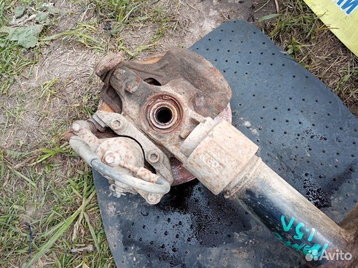 Стойка амортизатора переднего левого Chevrolet Lan