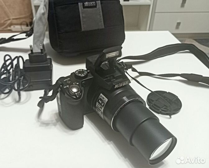 Зеркальный фотоаппарат Nikon coolpix P100