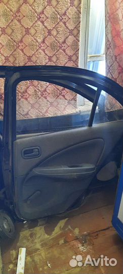 Дверь задняя правая для Nissan Almera