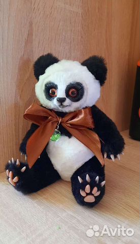 Игрушка панда