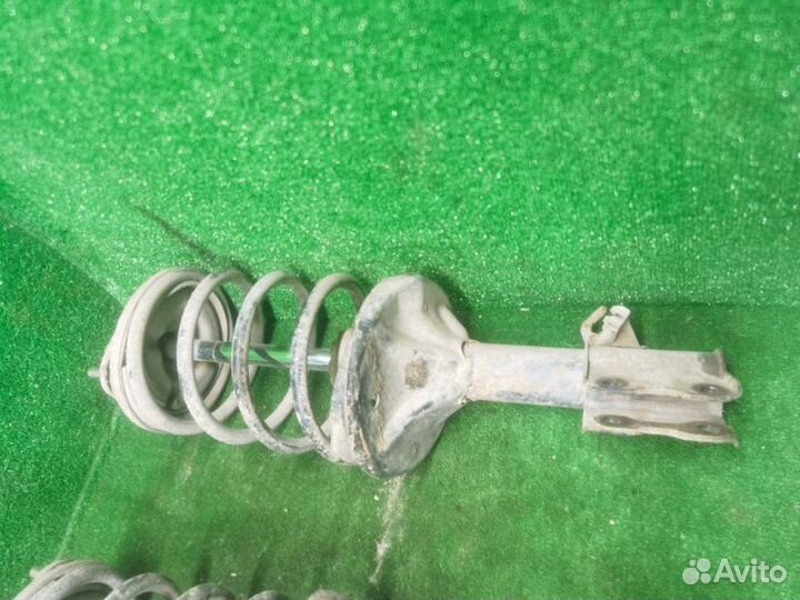 Амортизатор, стойки передний Mitsubishi Lancer 9