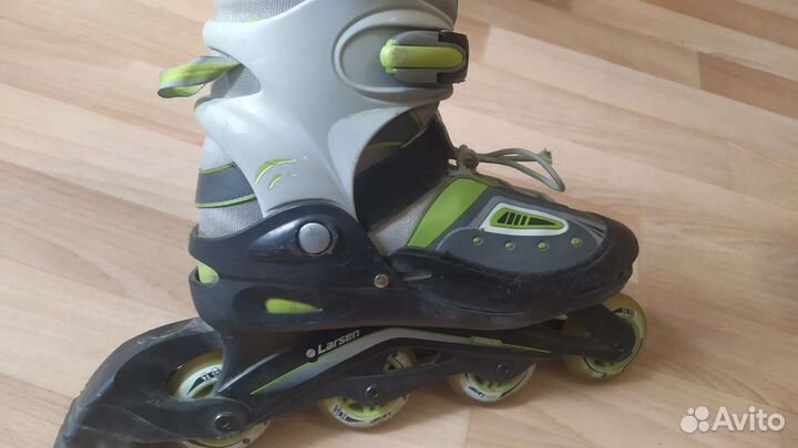 Роликовые коньки