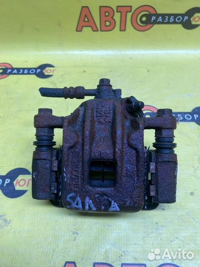 Суппорт задний левый Hyundai Santa Fe Classic SM