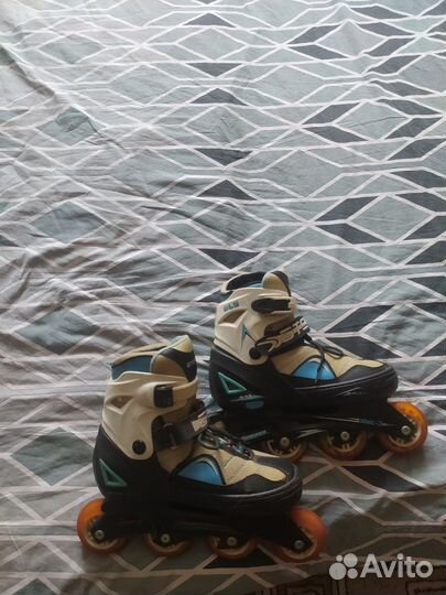 Роликовые коньки