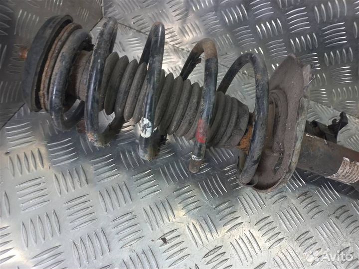 Стойка амортизатора передняя левая Ситроен Berli