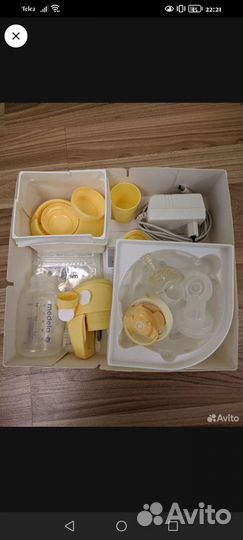 Молокоотсос medela электрический