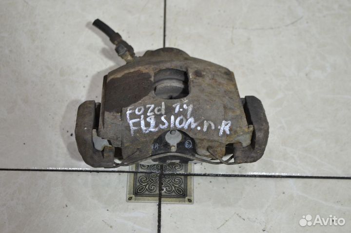 Тормозной суппорт передний правый Ford Fusion