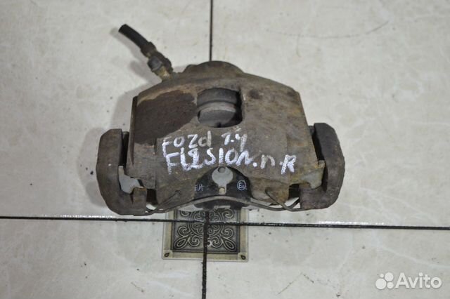 Тормозной суппорт передний правый Ford Fusion