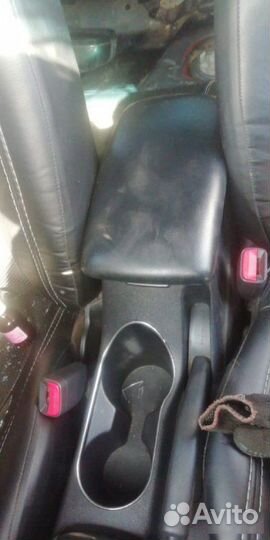 Подлокотник Kia Cerato 2