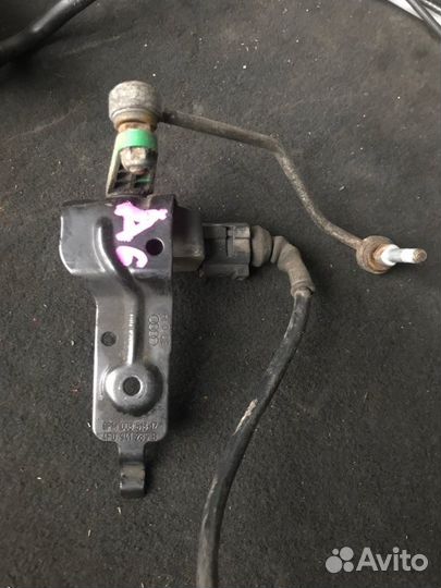 Датчик высоты дорожного просвета Audi A6