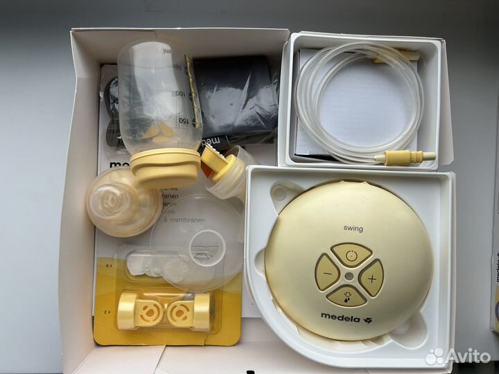 Молокоотсос medela swing