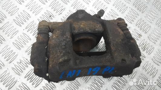 Суппорт тормозной передний левый toyota avensis T2