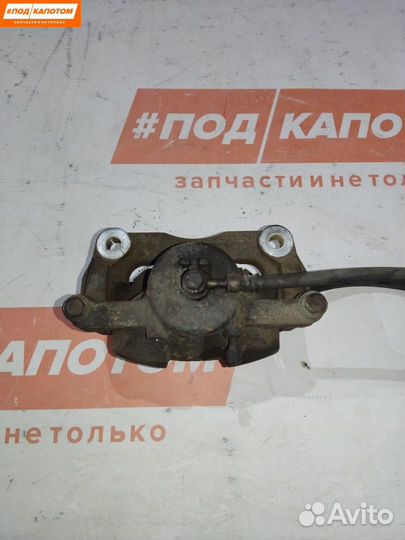 Суппорт тормозной передний левый Nissan X-Trail