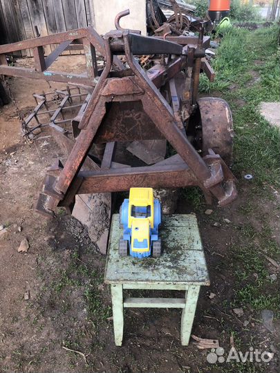 Плуг трехкорпусный