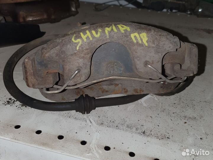 Суппорт тормозной Киа shuma R.L