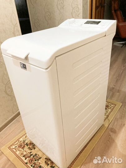 Стиральная машина автомат с вертикальной загрузкой