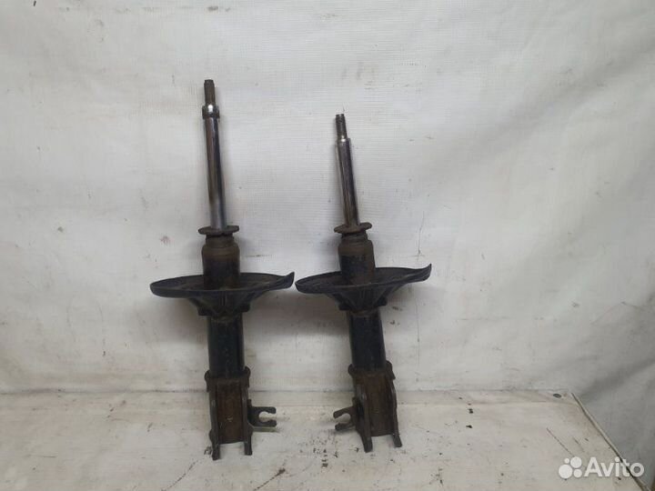 Стойки (передние) Mazda 626 седан 1997